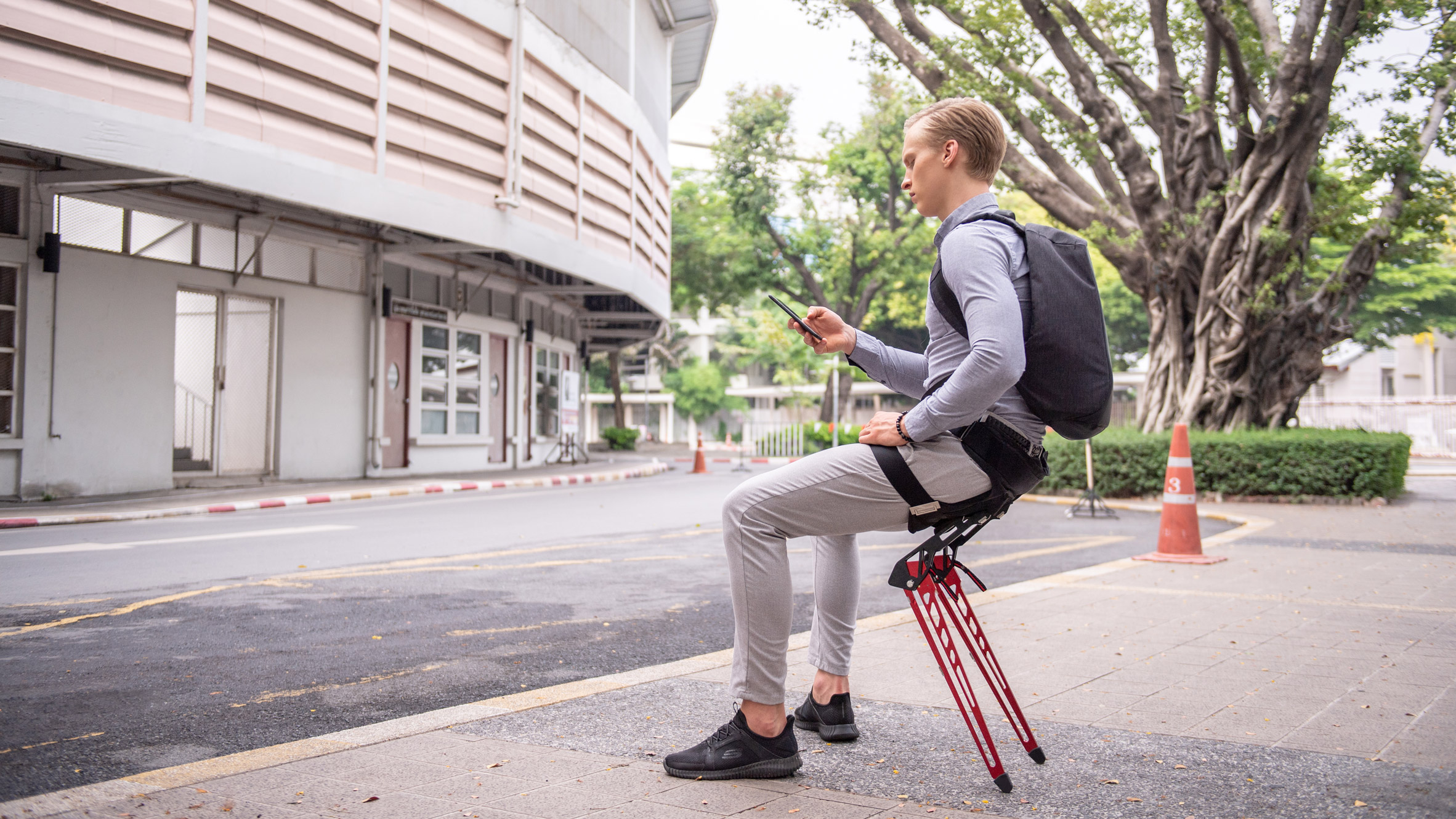 Lex by Astride is a wearable chair that allows its user to sit